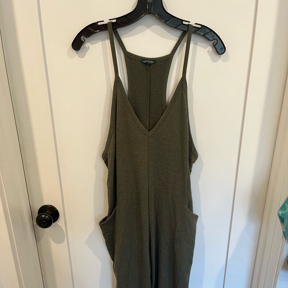 Green jumpsuit with pockets